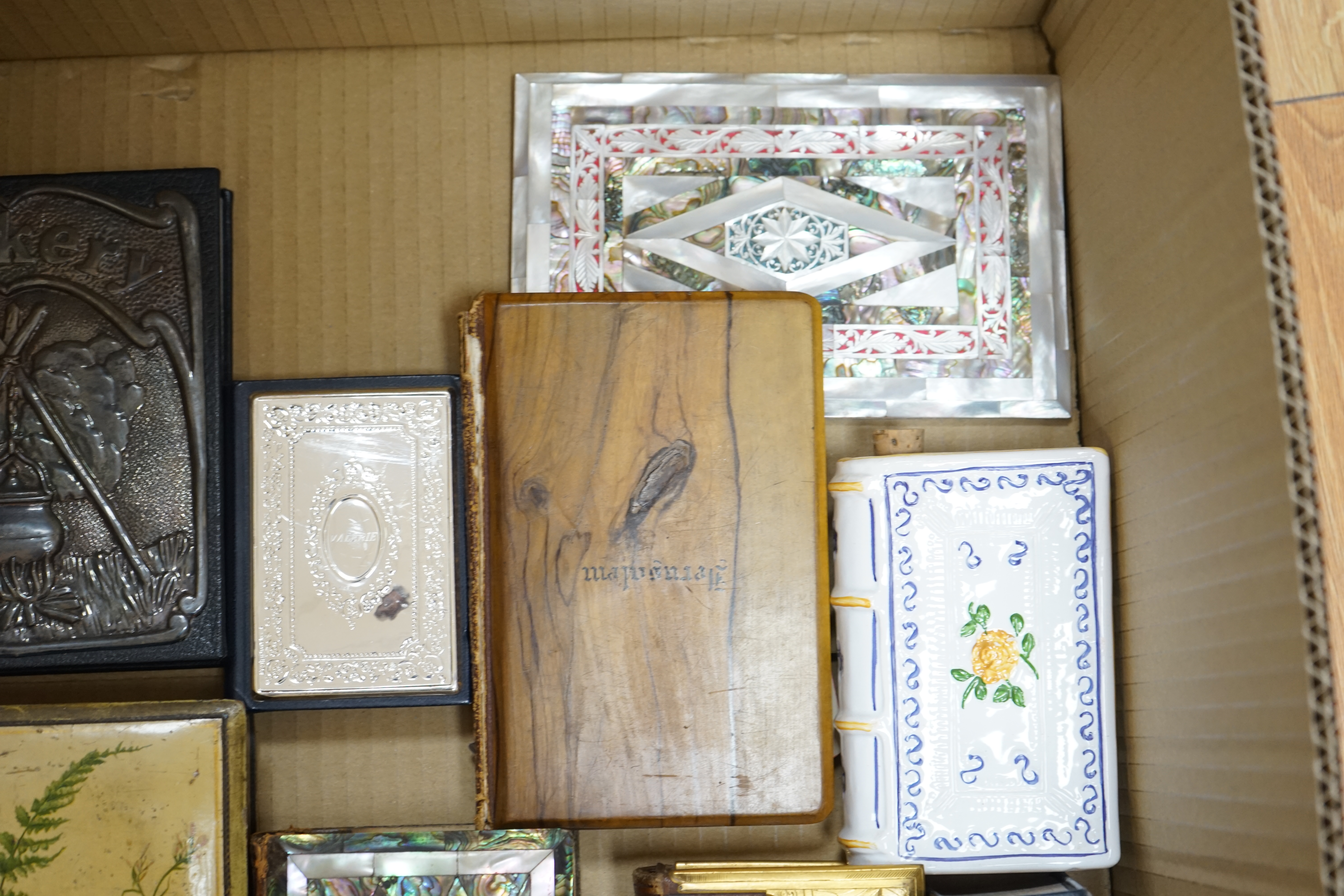 A small group of other assorted novelty bindings, including mother of pearl, leather and silver plate. Condition - varies